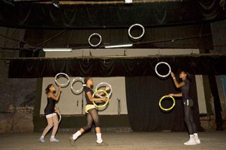 Circus school Students: Sydney Silvero; Zenisley Peña; Alioniuska Morales, practising in the theatre