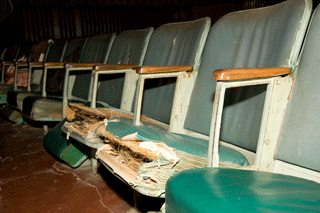 Theatre interior showing repairs needed to seats