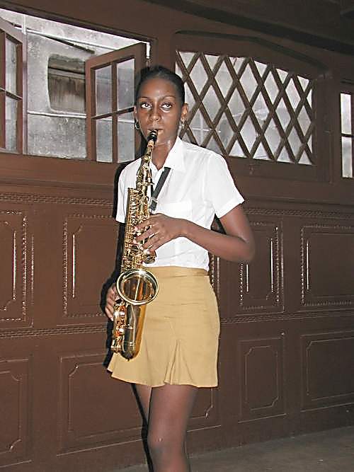 Student at the national Music School playing a saxophone which needs 19 new reeds a year