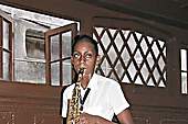 Student at the national Music School playing a saxophone which needs 19 new reeds a year